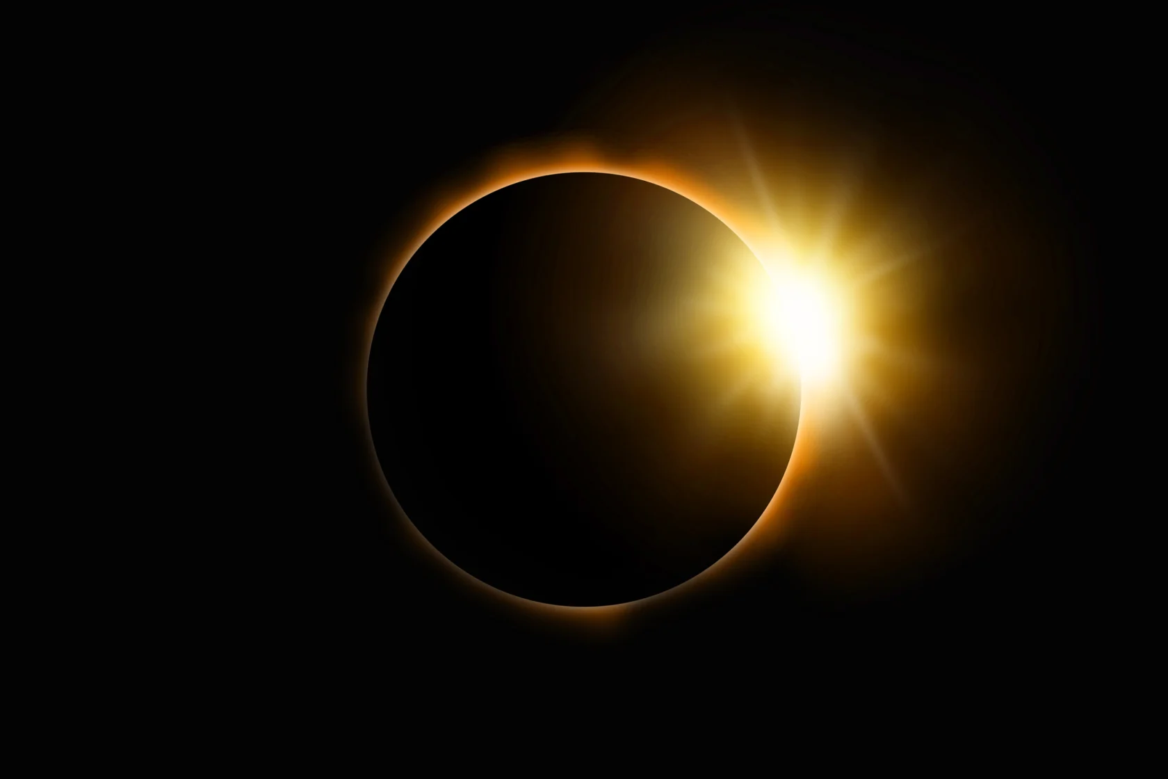A solar eclipse with the sun's corona glowing behind the moon, creating a bright, radiant effect.