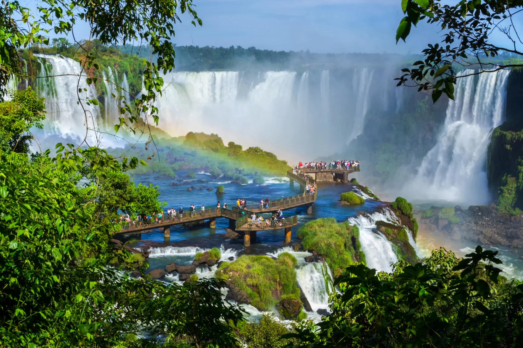 ourists at Iguazu Falls, one of the world's great natural wonders, near the border of Argentina and Brazil.
