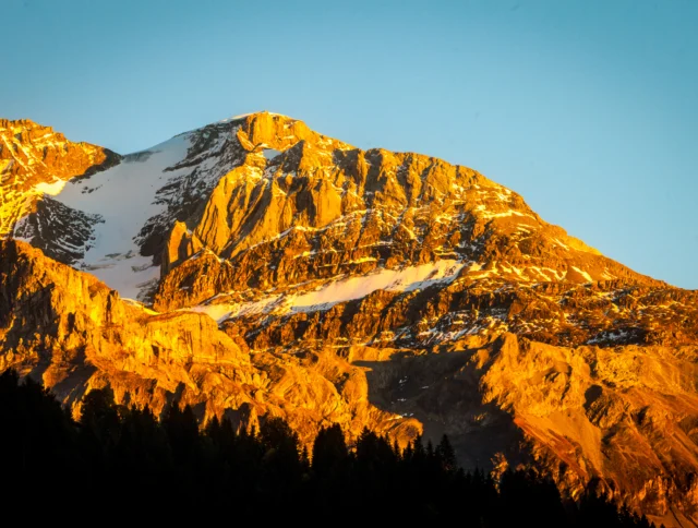 Sun setting on Wildstrubel Massif above Lenk